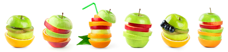 Stack of mixed fruit slices on white background. Collection of fresh foodの写真素材