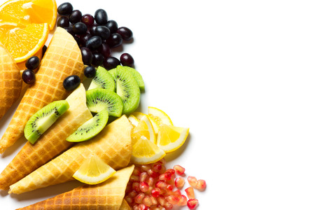 Fresh mixed fruits in cones.の写真素材