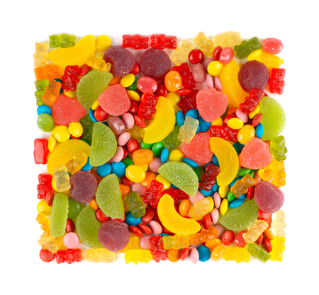 Mixed colorful candies. Color sweets on white backgroundの写真素材