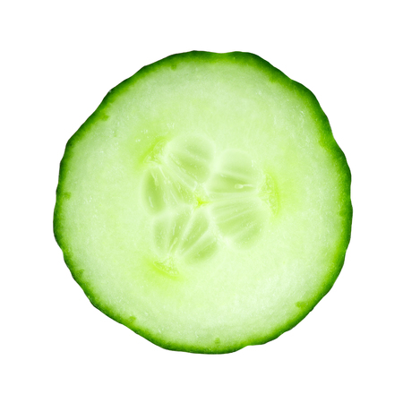 Fresh cucumber slice closeup isolated on white backgroundの写真素材