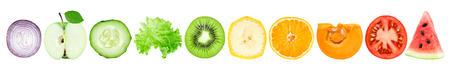Collection of fruit and vegetable slices isolated on whiteの写真素材