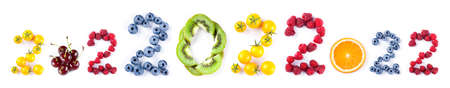 New year 2022 made of fruits on the white background. Healthy foodの写真素材