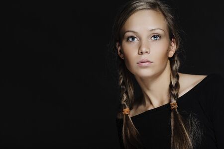 Young girl with plaits in hairの写真素材