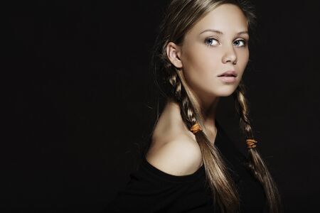 Young girl with plaits in hairの写真素材