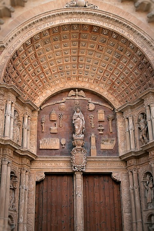 arch of the entrance to the ancient Catholic Cathedralの写真素材
