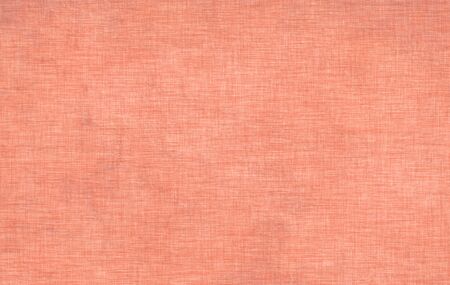 Vintage pink fabric texture. Old pink textured background. Color textile.の写真素材