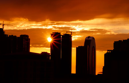 City evening landscape with sunset. Sunset is in the town.の写真素材