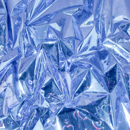 Iridescent blue shiny background. Holographic abstract soft pastel colors backdrop. Hologram Foil Aesthetic. Trendy vaporwave creative gradient.の写真素材