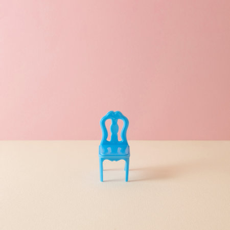 Blue chair against pastel pink background. Minimal concept composition.の写真素材