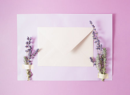 Creative arrangement with envelope and dry lavender. Minimal border concept. Copy spaceの写真素材