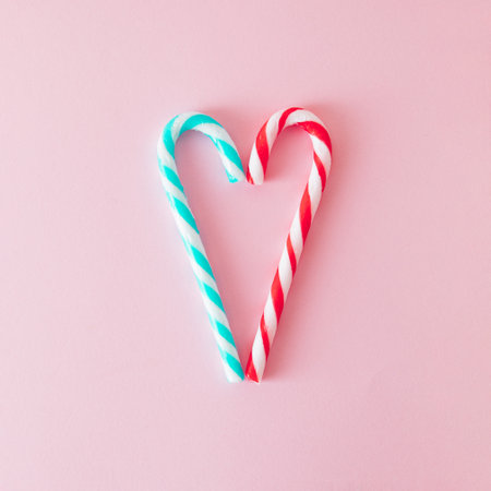 Heart shape made of Christmas candys. Creative concept of Christmas and Valentine's Day. Flat lay.