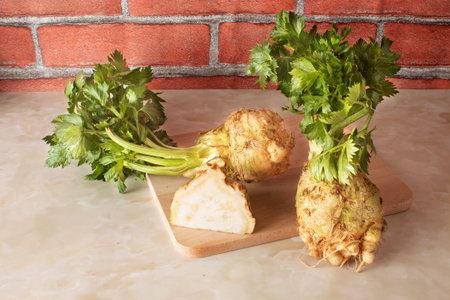 Fresh celery on kitchen marble table.  Fresh organic food concept