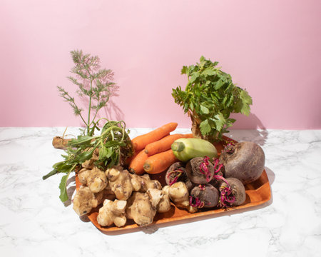 Organic fresh vegetables on a tray in the kitchen. Healthy raw food conceptの写真素材