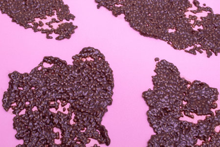 Texture of a smeared chia pudding on a pink backgroundの写真素材