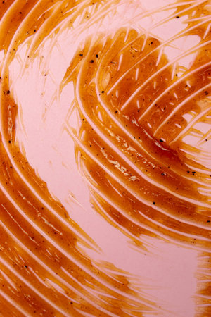 Texture of thick smear brown cosmetic face or body scrub creamの写真素材