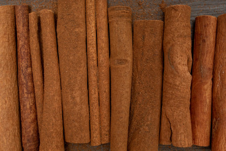 Close-up of cinnamon sticks spices and powder.の写真素材