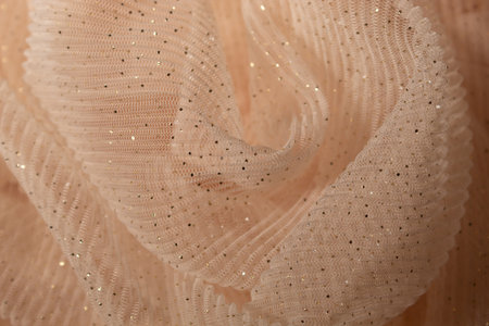 Concept with waves pink mesh fabric. Retro fashion aesthetic. Can use as wedding background. Luxurious background designの写真素材