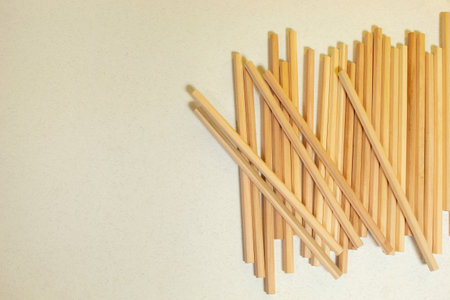 Graphite pencils on the desk on light background.