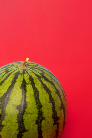 Watermelon on a red backgroundの写真素材