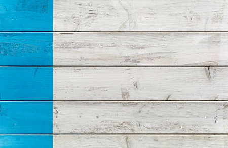 Blue and white old painted wood wall - Aged texture or background with sea blue color strip - layout concept with mediterranean typical colorの写真素材