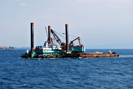 Platform with cranes on the water