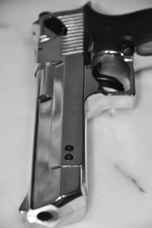 Detailed images of chrome pistol