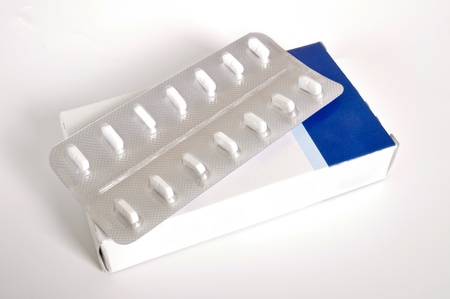 Packaged pills on a white background