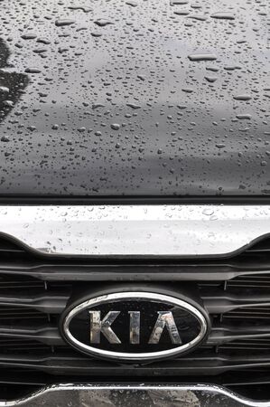 Kia logo on a wet black carのeditorial素材
