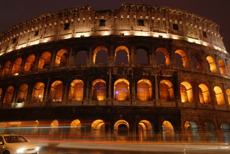 Roman Colosseum illuminated at nightの写真素材