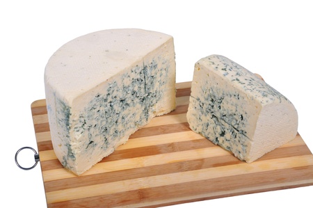 Moldy cheese on a white backgroundの写真素材