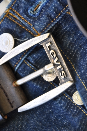 Levis blue jeans and a belt のeditorial素材