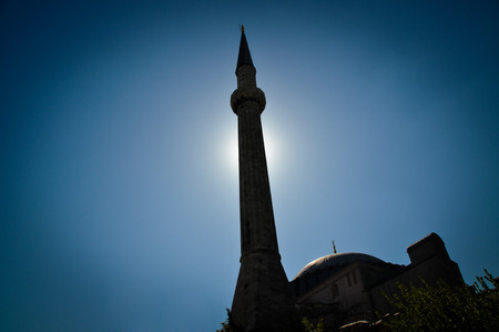 Minaret of the mosque and the skyの写真素材