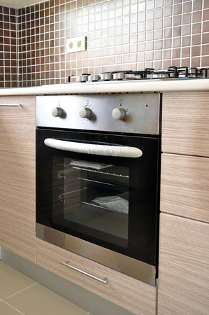 Built-in oven and hob in a modern kitchenの写真素材