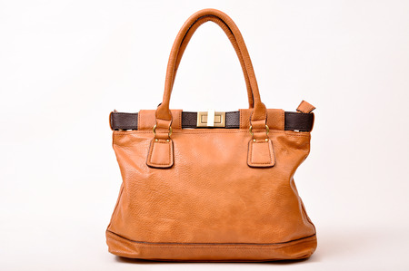 A stylish bag lady on a white backgroundの写真素材