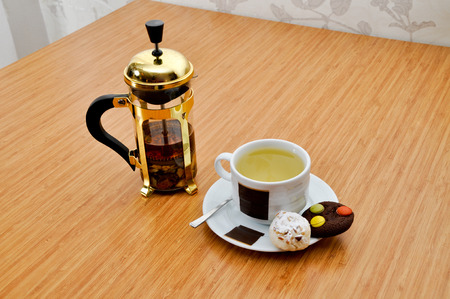 Cup of herbal tea and delicious cookiesの写真素材