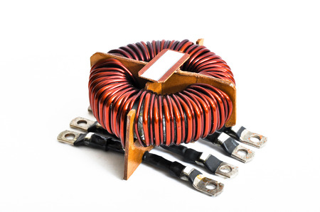 Transformer copper coil isolated on a white backgroundの写真素材
