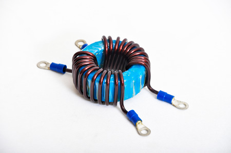 Transformer copper coil isolated on a white backgroundの写真素材