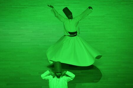 Mevlana dervishes dancing in the museum, Konya. 2014.