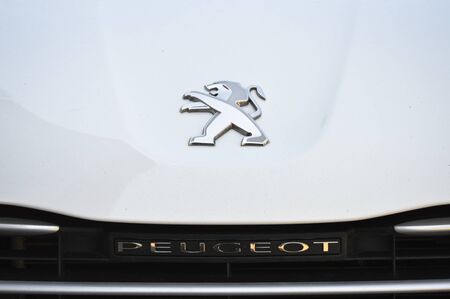 Close up Peugeot logo. Chrome metalのeditorial素材