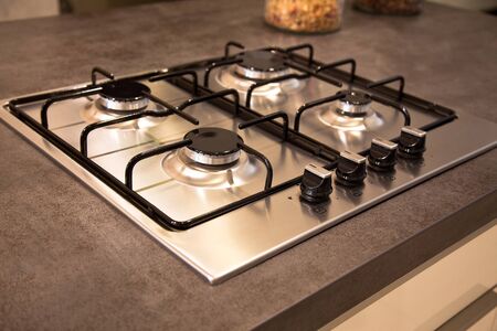 Modern luxurious kitchen and stainless steel built-in gas oven
