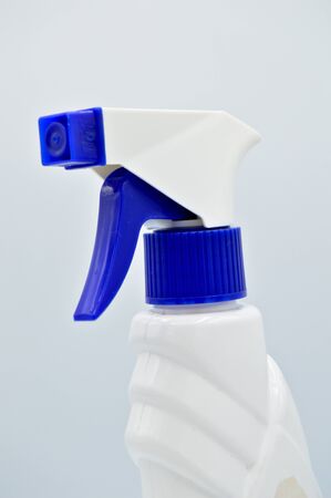 White colored plastic spray detergent bottle. Cosmetic, container. Isolated on white background