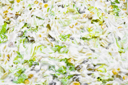 Fresh and healthy mayonnaise corn lettuce salad, close-up shotの写真素材