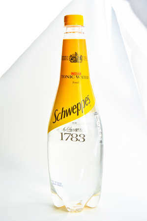 Schweppes Tonik Indian carbonated drinks in 1 liter plastic bottles, Istanbul Turkey July 05 2020, isolated on a white backgroundのeditorial素材
