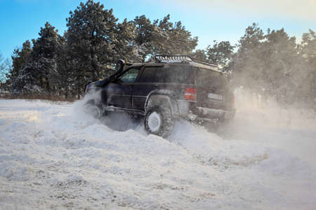 One SUV 4x4 cars go on snowy road, winter season, very cold, Istanbul Turkey, January 1, 2016
