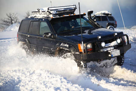 One SUV 4x4 cars go on snowy road, winter season, very cold, Istanbul Turkey, January 1, 2016