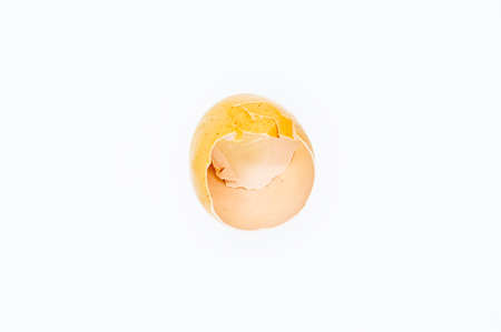 Brown broken egg shells, cracked egg shells, isolated on white background