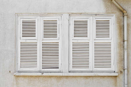 Buyukada in Istanbul located in old antique house old-fashioned wooden windows and shutters,...