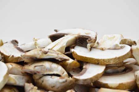 Healthy and fresh brown chestnut mushrooms isolated on white backgroundの写真素材