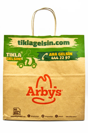 Paper bags used in Arby's restaurants in Turkey, Arby's recyclable paper bag, Natural Product, isolated on white background, Istanbul Turkey 06 September 2020のeditorial素材