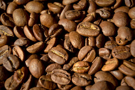Carefully selected and roasted fresh coffee beans, coffee beans background